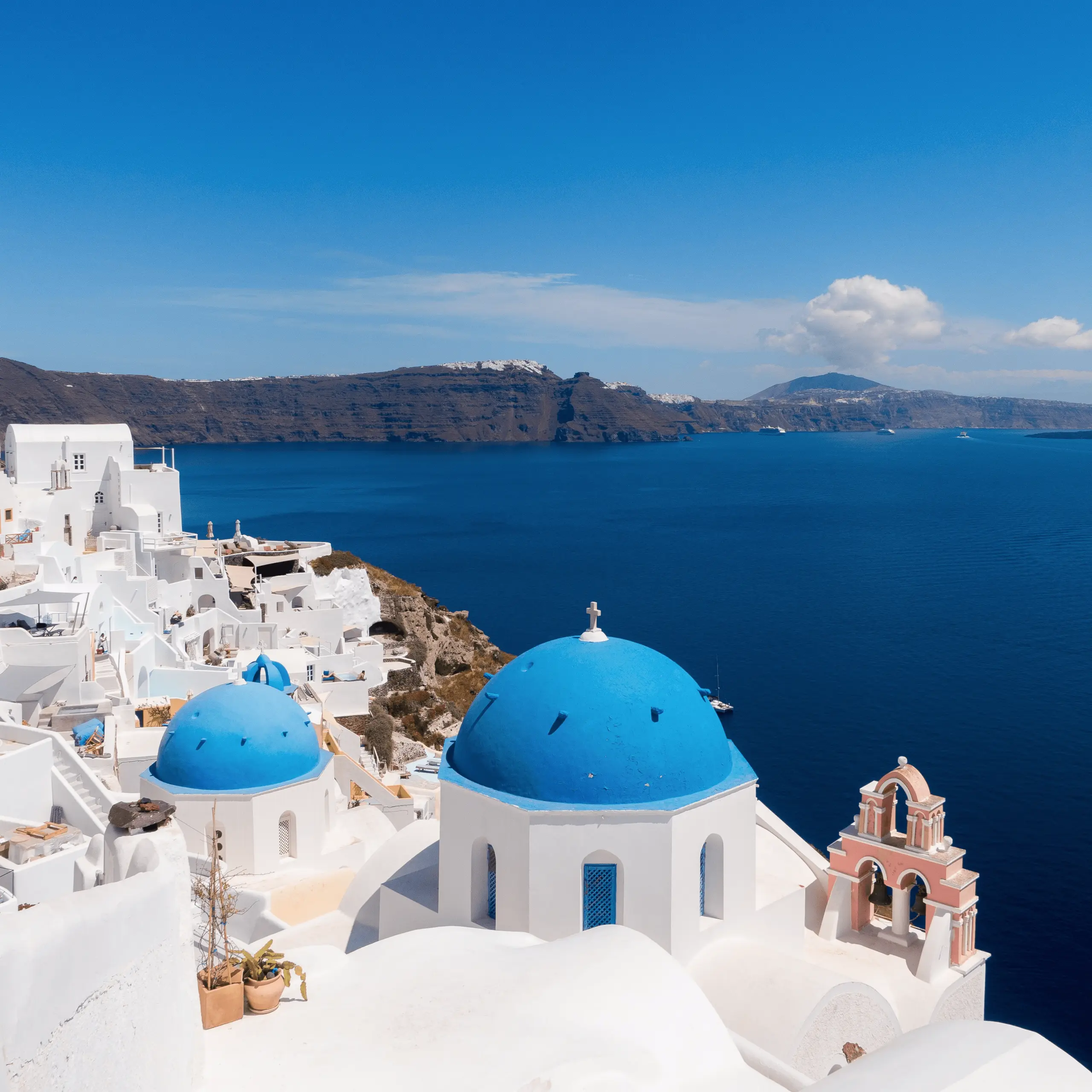 Acropolis Homes - Santorini - Grecja - Biuro Nieruchomości - Zdjęcie w tle
